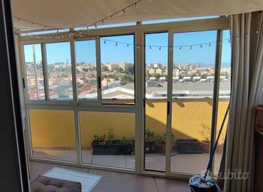 Veranda terrazzo con portafinestra 