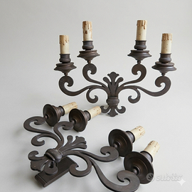 Coppia di candelabri applique in ferro lavorato