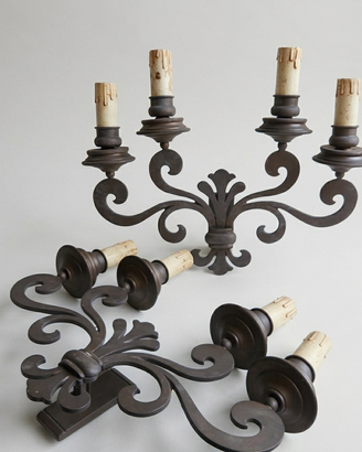 Coppia di candelabri applique in ferro lavorato