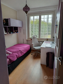 Camera in casa con giardino, zona universitaria