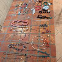 Lotto gioielli e bigiotteria + oro 18k