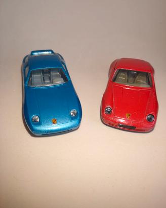 Porsche 928 S4 + 911 Carrera 1:43 Burago Vintage 