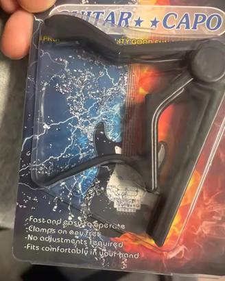 capo tasto barrè per chitarra 