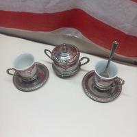 zuccheiera con piattini in argento