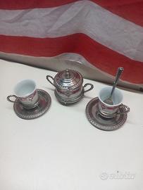 zuccheiera con piattini in argento