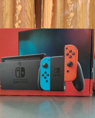 Nintendo Switch + 2 giochi + Joycon Extra