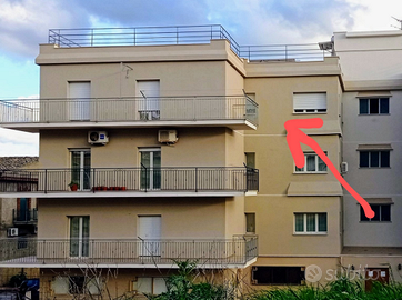 Appartamento luminoso e centrale con box e terreno