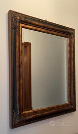 Specchio rettangolare con cornice decorata