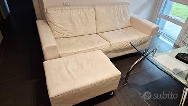 Divano letto in pelle di caribù con pouf