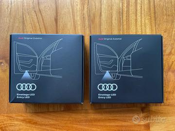 Luci LED sotto portiera logo Audi, originale