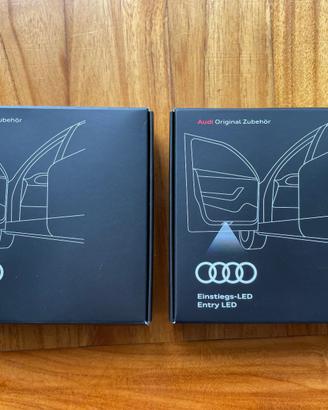 Luci LED sotto portiera logo Audi, originale