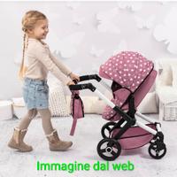 Passeggino per bambole ancora impacchettato