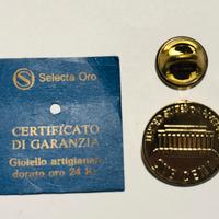 Spilla One Cent