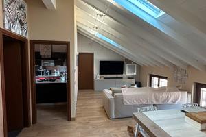 Trilocale mansardato arredato