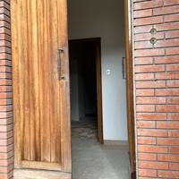 Porta in legno a due ante