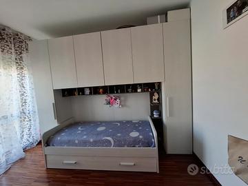 Armadio a ponte matrimoniale + Divano letto