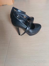 décolleté in pelle con plateau misura 37 tacco 12