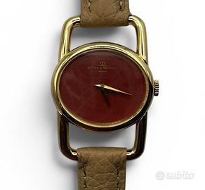 Baume Mercier”Lucchetto “in oro giallo
