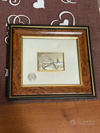 Quadro con cornice in legno, placca argentata.