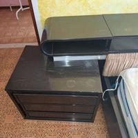 letto anni 70 - in legno nero. con testata e comod