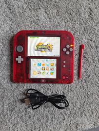 nintendo 2ds rosso trasparente con gioco