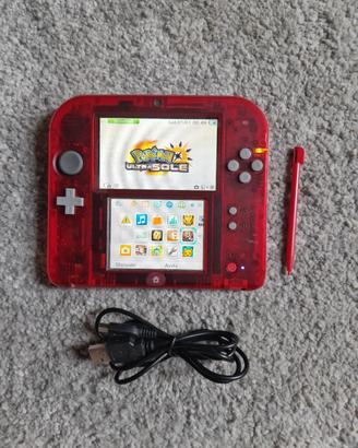 nintendo 2ds rosso trasparente con gioco