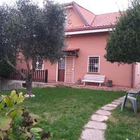 Camera in contesto villino