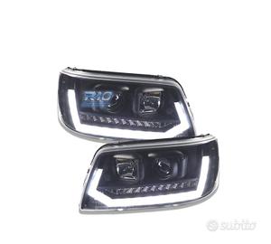 FARI VOLKSWAGEN VW T5 03-09 NUOVO LOOK CON FRECCIA