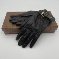 GUANTI DONNA GUCCI GG NERO PELLE GG FIBBIA DORATA