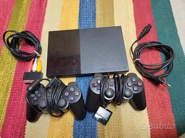 PlayStation 2 Slim + 2 joypad + 21 giochi i