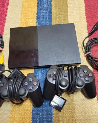 PlayStation 2 Slim + 2 joypad + 21 giochi i