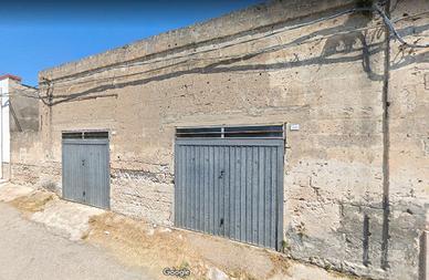 Garage con giardino di pertinenza