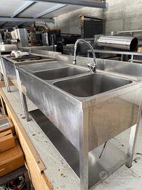 Lavandino doppia vasca con miscelatore