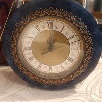 Borsa a forma di orologio in pelle