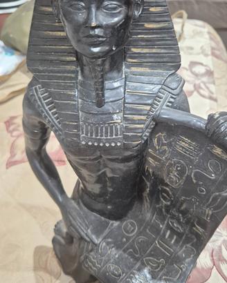 statua 