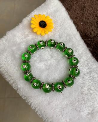 Bracciale perle verdi con evil eye portafortuna