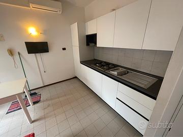 Bilocale con terrazzo e posto auto