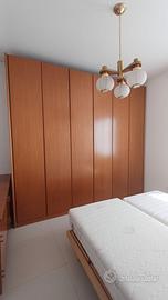 
Camera da letto  con armadio, comò e due comodini