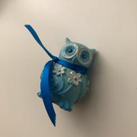 Gufo carino celeste e bianco simbolo positivo