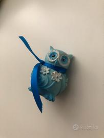 Gufo carino celeste e bianco simbolo positivo