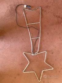 Grande Stella natale elettrica luce illuminata