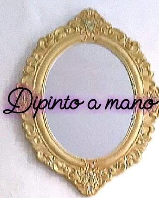 Specchio dipinto a mano.