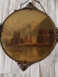 Cornice circolare con castello e lago romantico