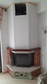 camino a legna con ventilazione canalizzata