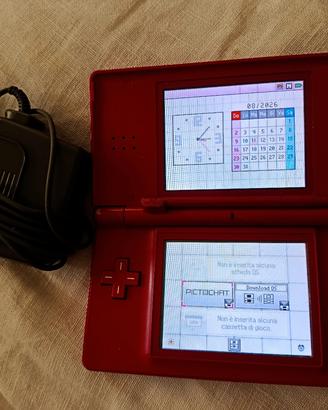 Nintendo DS Lite  + Custodia Hello Kitty + Giochi
