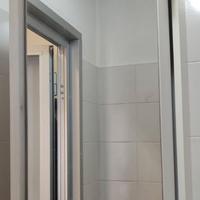 Specchiera da bagno con anta girevole