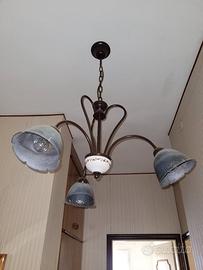 lampadario con campana di vetro scuro