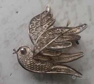 Spilla antica uccello in filigrana d'argento