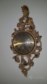 Orologio da muro scolpito