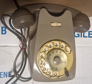 Telefono sip a disco grigio da muro